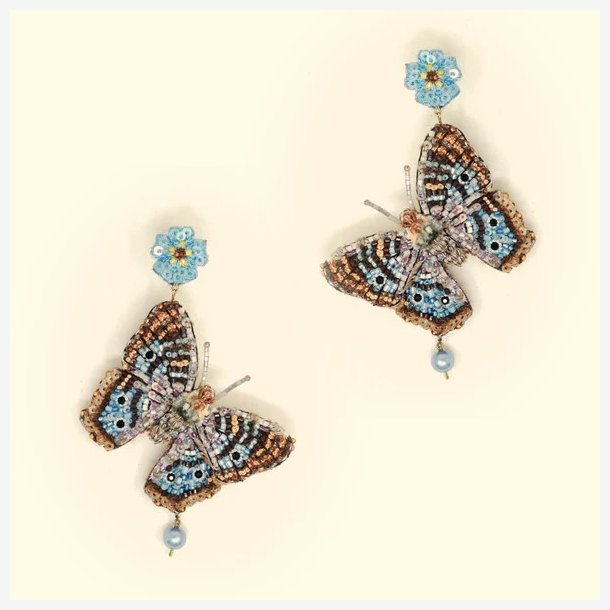 Trovelore - �reringe - White peacock butterfly